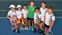 Young indigenous tennis players get some court time with Ash Barty