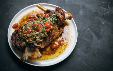 Roast lamb shoulder with cherry tomato vinaigrette